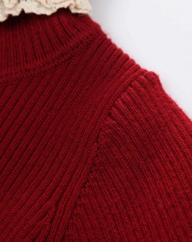 女童枣红毛衣