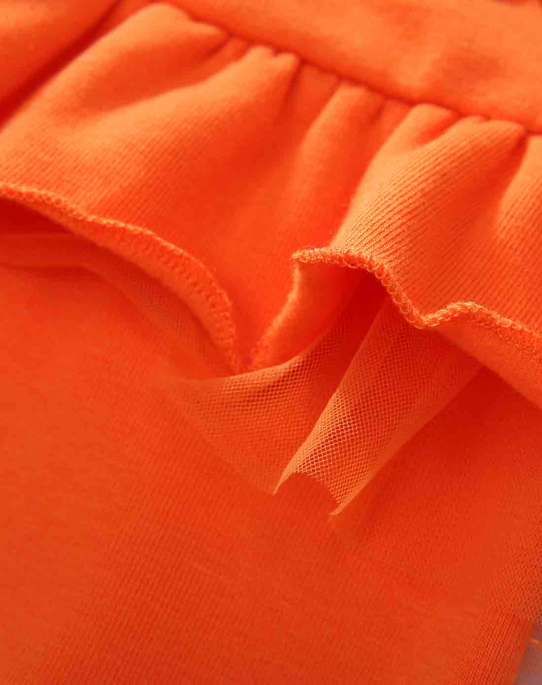 女童橘色打底裤