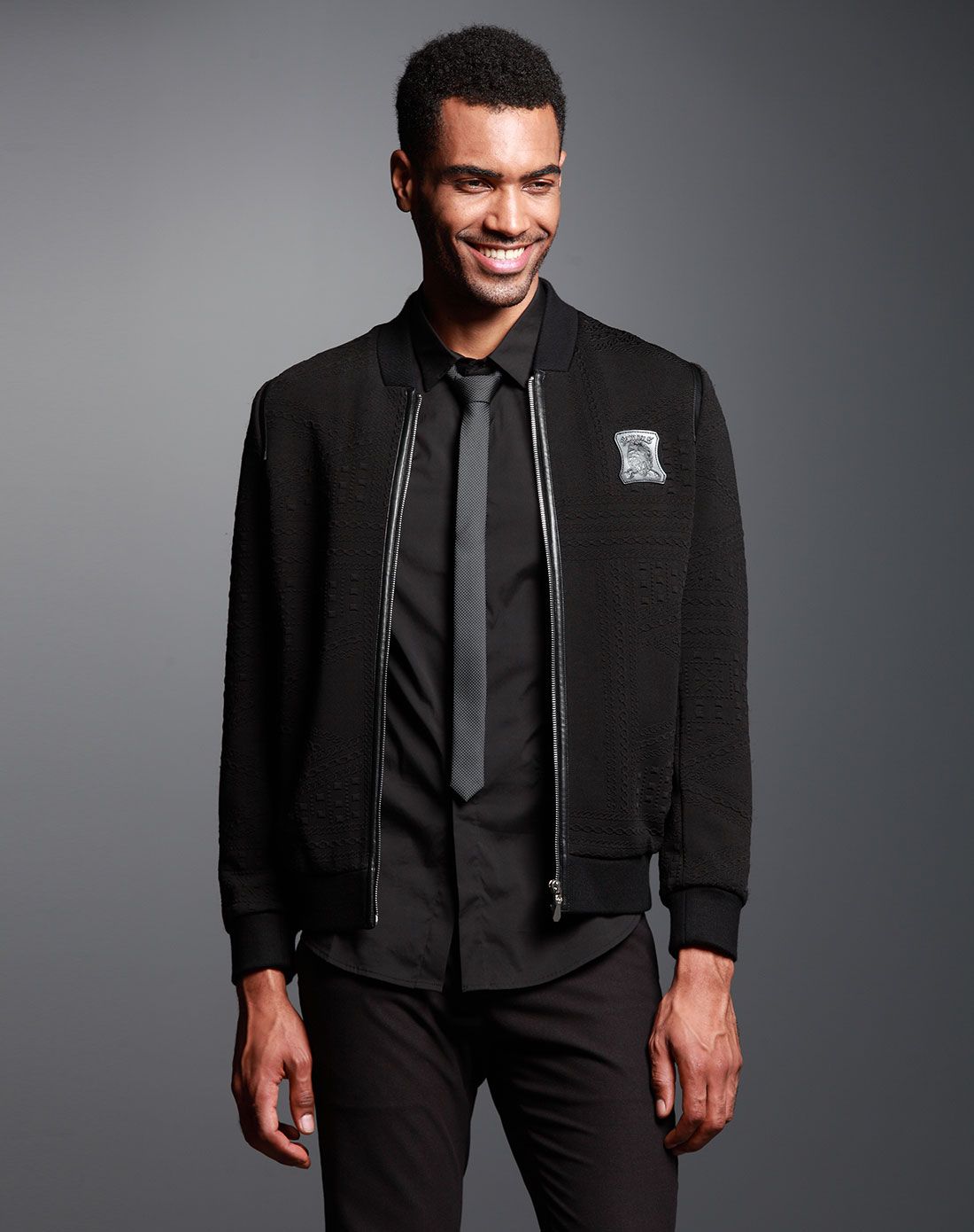 玄黑色时尚拼皮防皱棒球领夹克