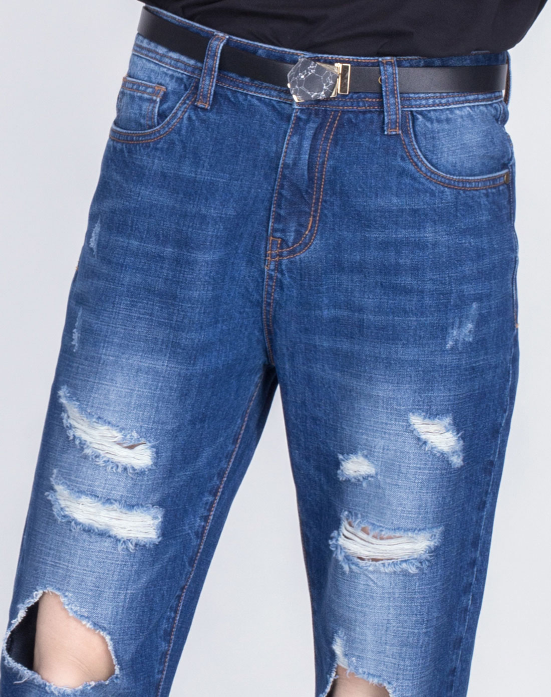 蓝色中腰吊磨破洞牛仔裤