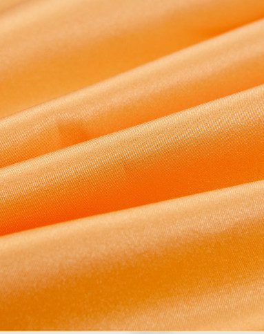 橙色打褶中长裙