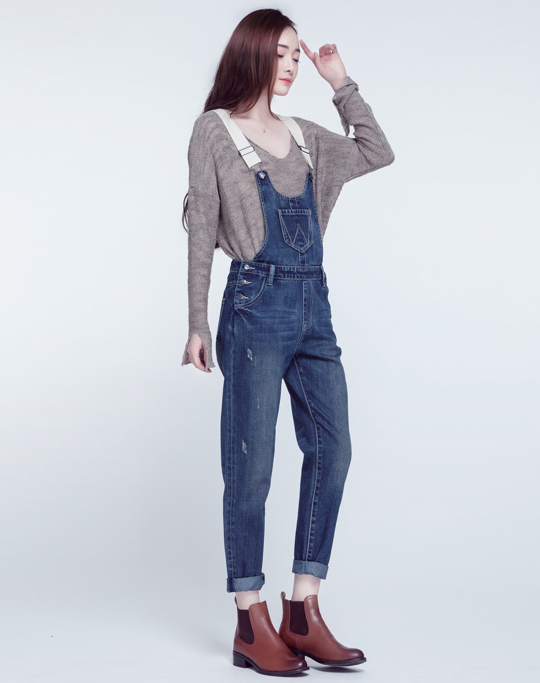 女款蓝色中腰吊磨侧边扣子牛仔背带裤