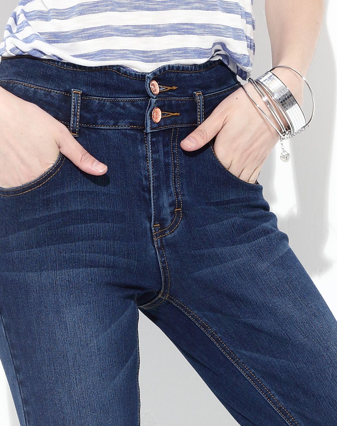 怀旧蓝四面弹双扣紧身小脚牛仔裤