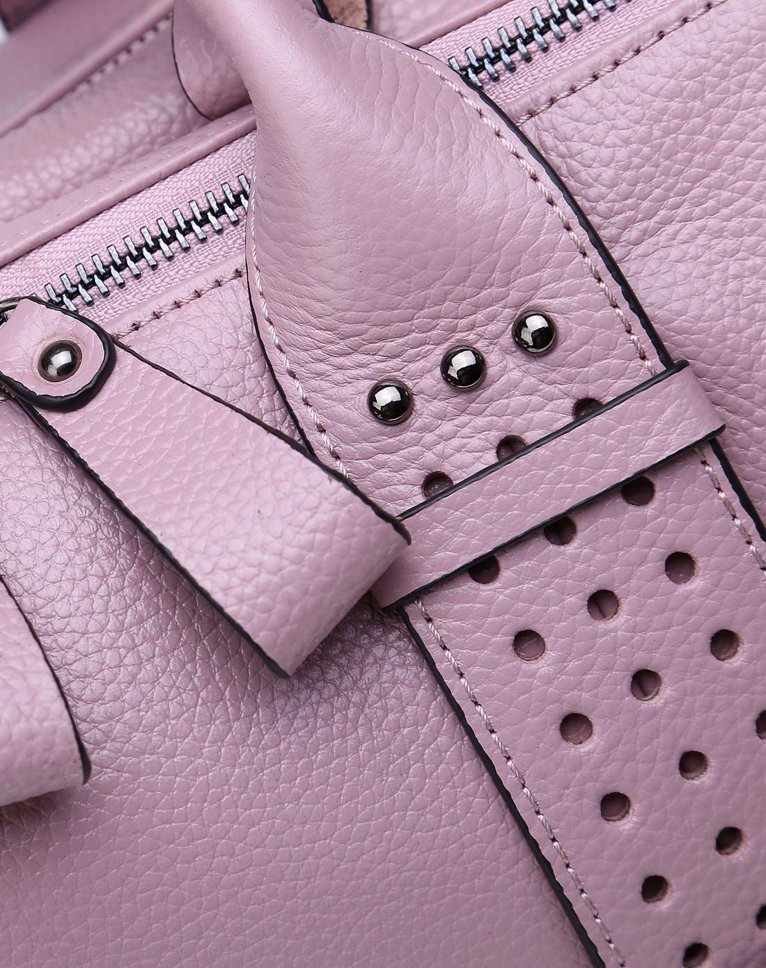 女款香芋粉色欧美时尚铆钉镂空装饰牛皮革手提斜挎包