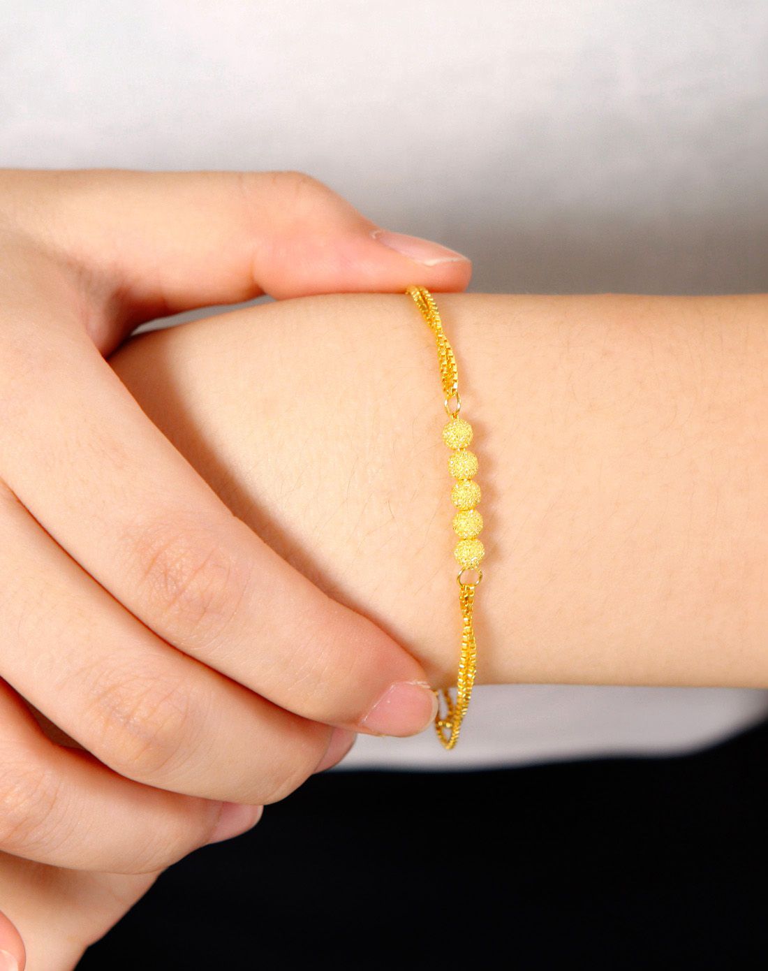 足金黄金精品手链 盒子间丁砂珠 5.73克