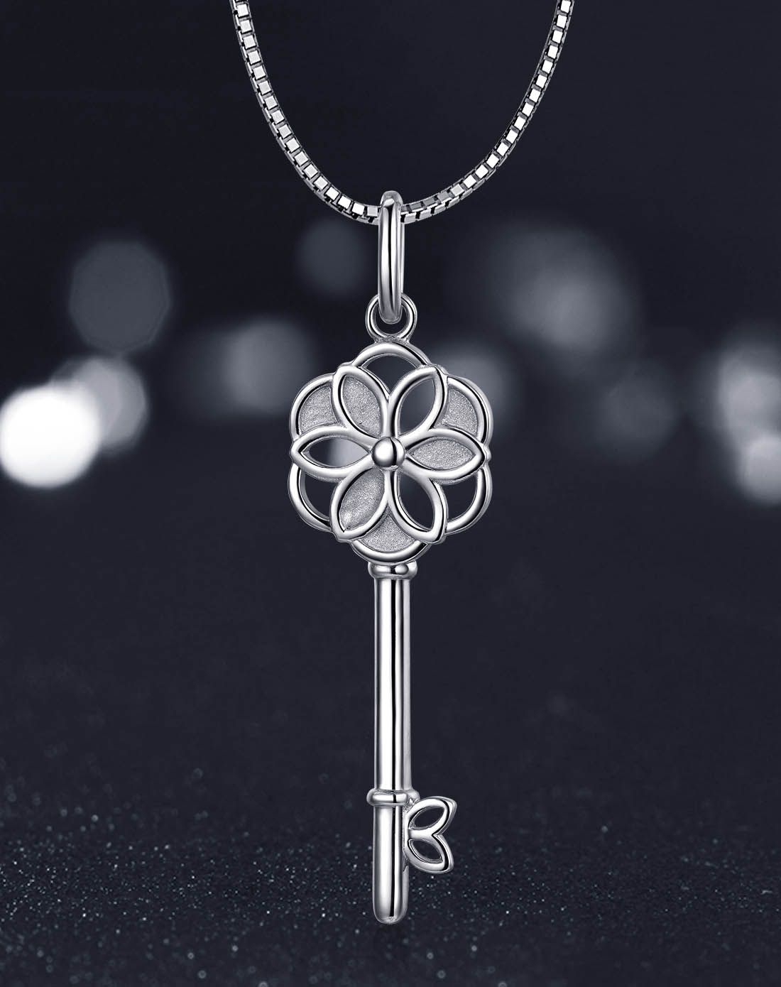 铂金pt950时尚韩版忘忧草钥匙吊坠(不含项链)