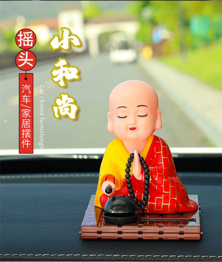 汽车摆件点头敲木鱼公仔抖音网红同款太阳能小和尚禅意车载内饰品