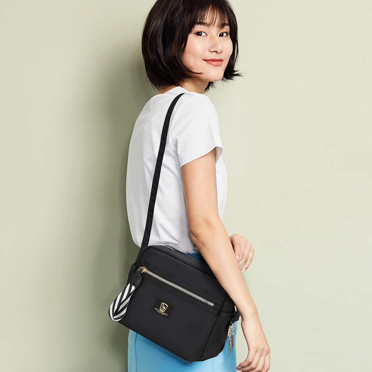 休闲简约经典女款织带女士单肩斜挎包