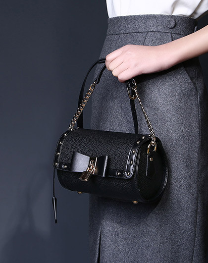 2017年新品时尚牛皮枕头包蝴蝶结百搭女款斜挎包小版