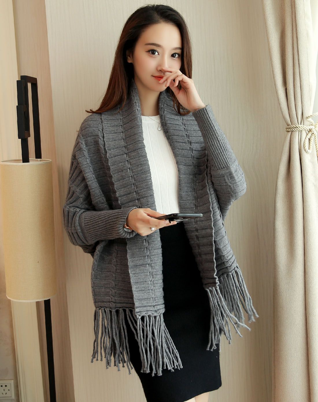 女卡其色韩版时尚流苏披肩针织开衫
