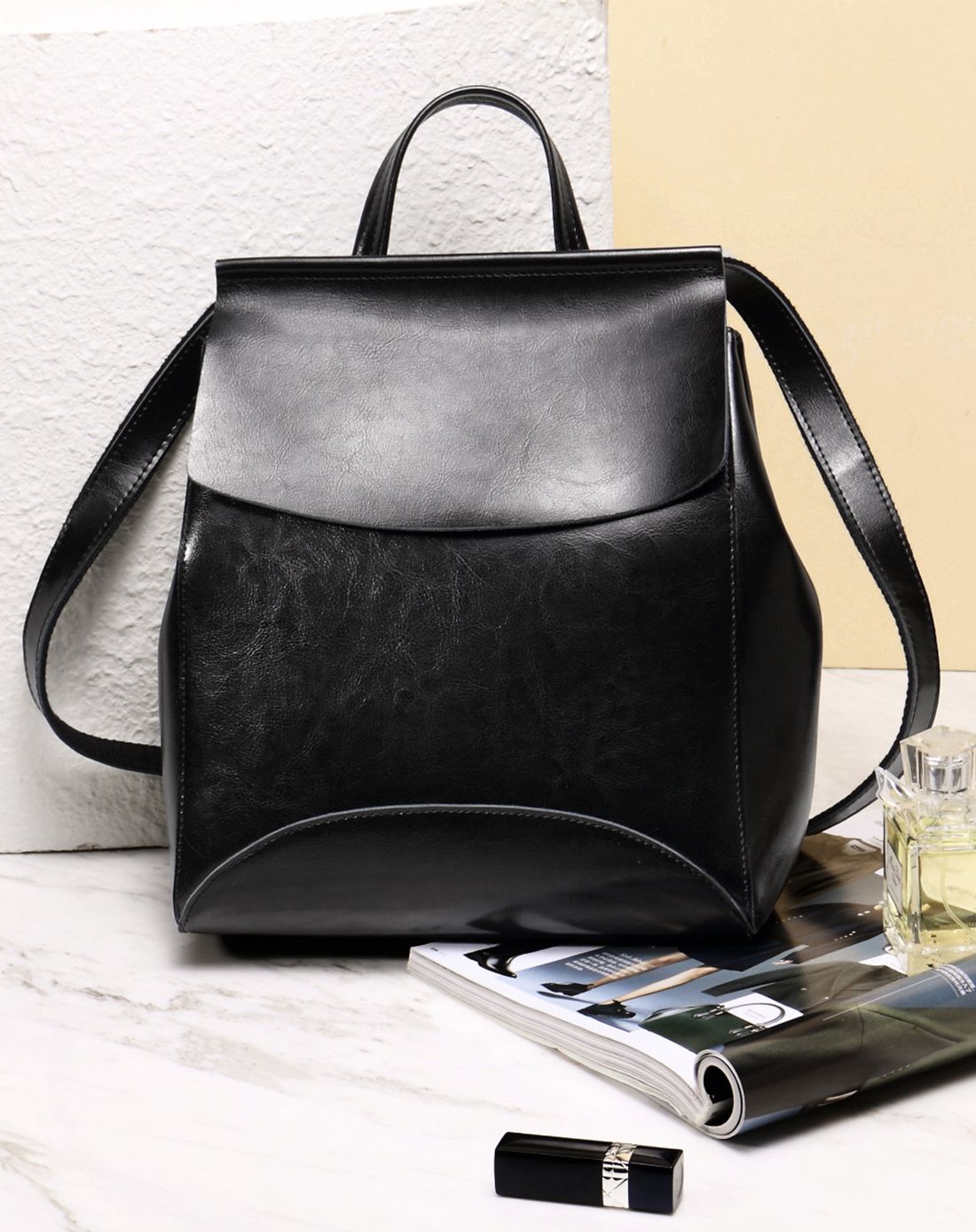 牛皮女士黑色时尚大容量双肩包