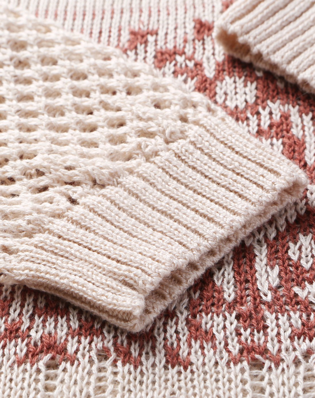 artka阿卡挑孔提花罗纹圆领不规则下摆针织衫