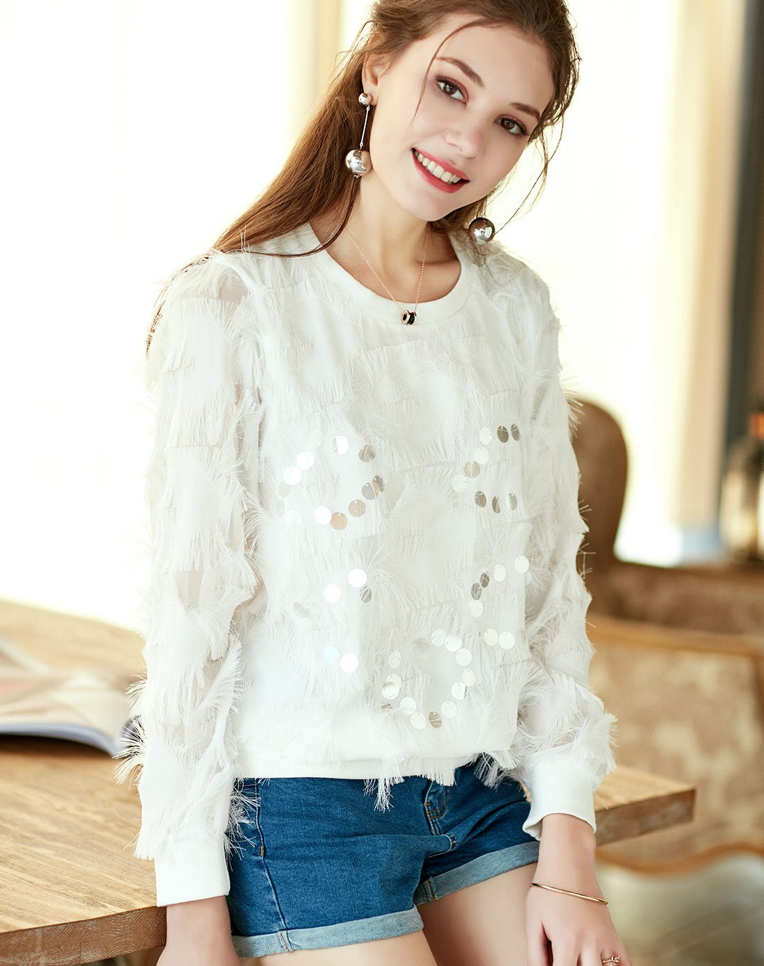 似水年华通勤百搭纯色圆领流苏上衣