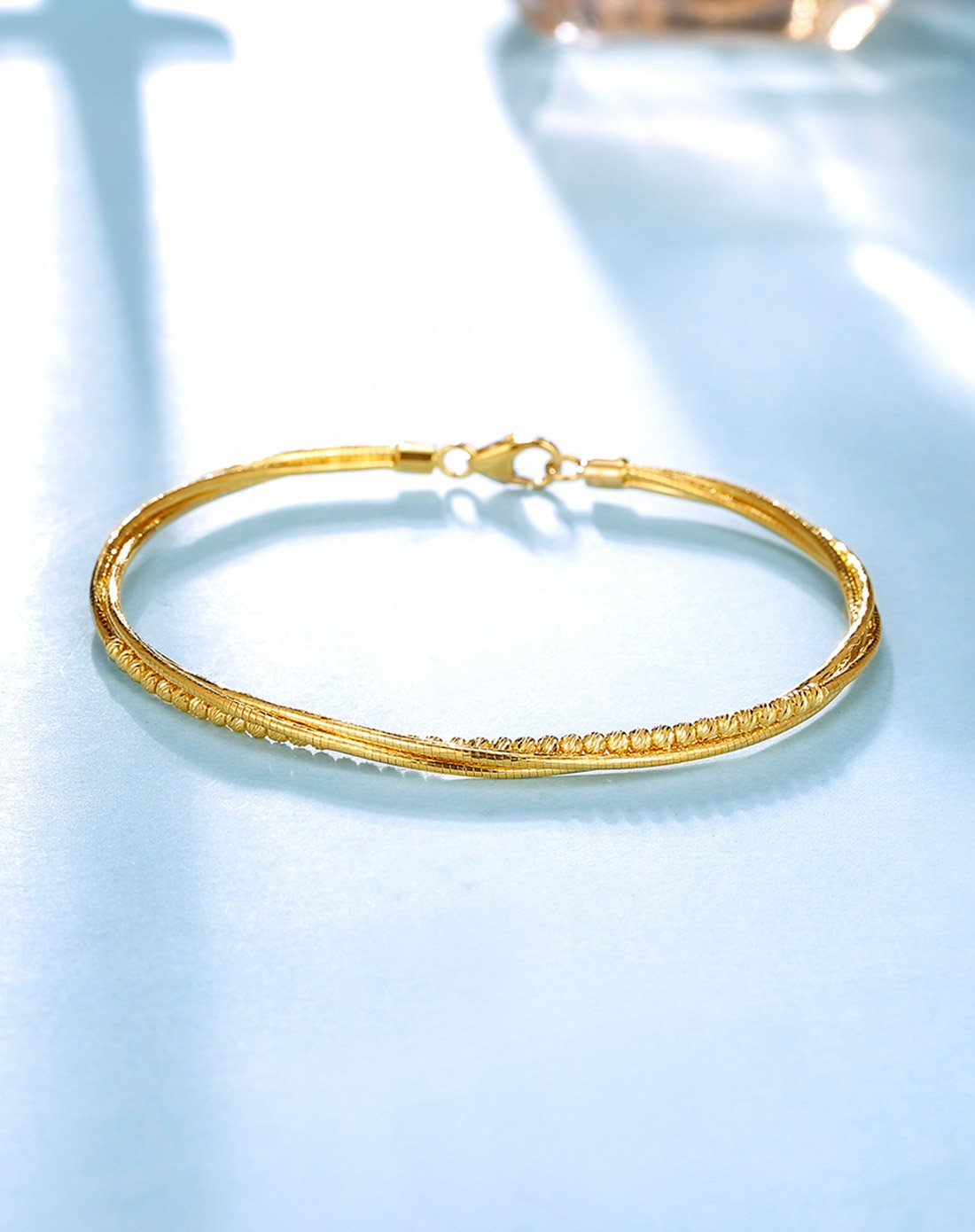 谢瑞麟18k金时尚麻花手镯