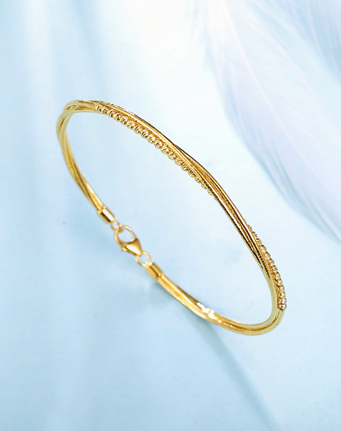 谢瑞麟18k金时尚麻花手镯