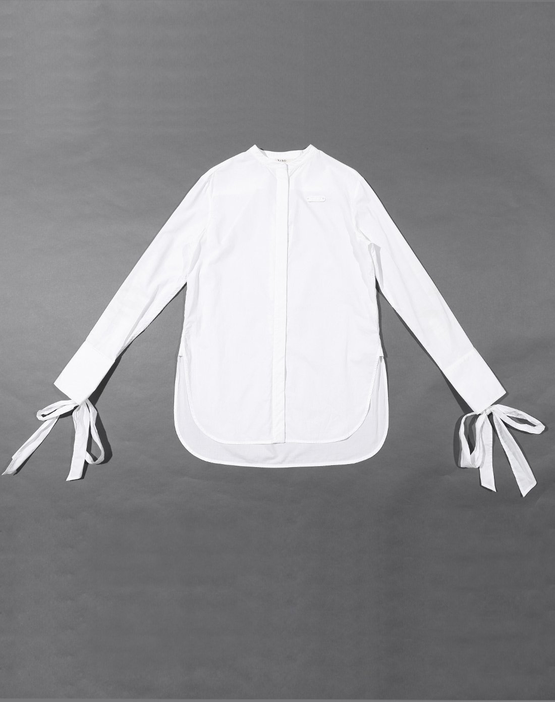 蝴蝶结不规则圆领白衬衫