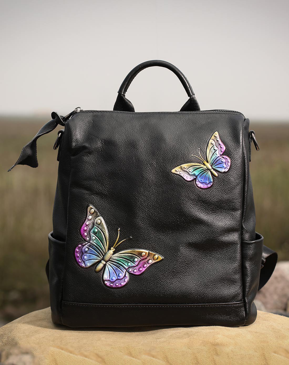 吐火罗新品简约牛皮蝴蝶双肩包