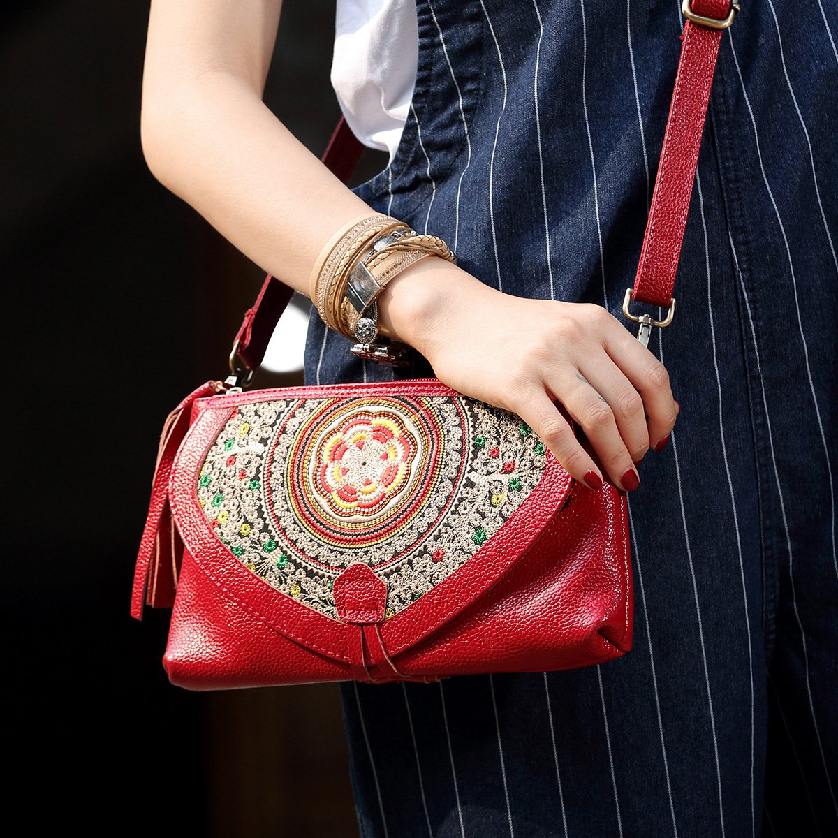 吐火罗2018新品民族风刺绣流苏牛皮单肩斜挎包