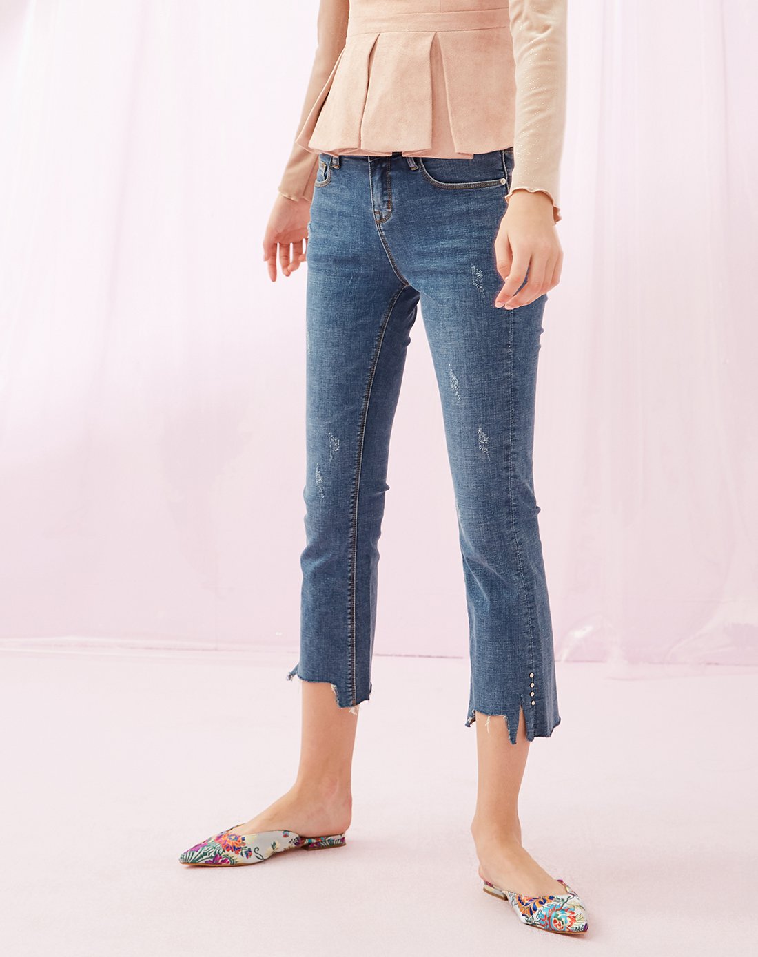 aike爱客2018蓝色不规则裤脚紧身牛仔裤女抓纹九分裤