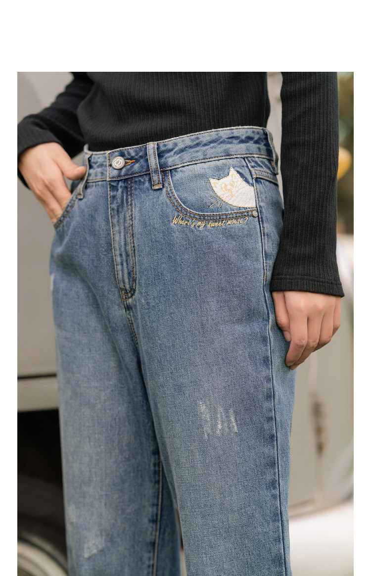 秋新女款时尚图案绣花毛边裤脚水洗显瘦棉质九分牛仔裤